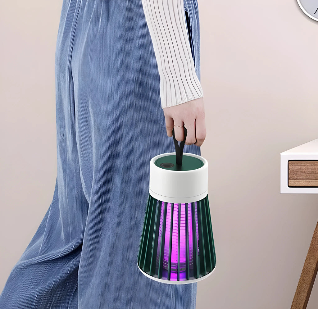 Electric-shock mosquito killer light purple light trap white plastic finish on tabletop indoor use