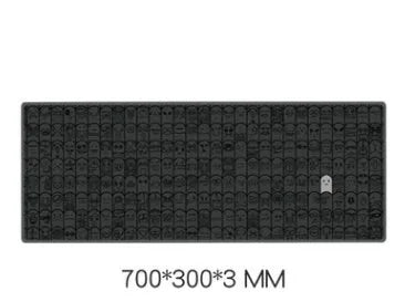 Grey cloth mousepad with wrist support sticker on a wooden desk