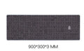 Grey cloth mousepad with wrist support sticker on a wooden desk