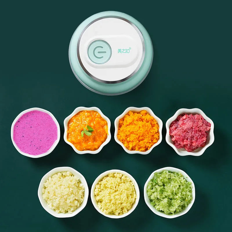 Portable electric garlic cutter with transparent chopping cup and stainless steel blades