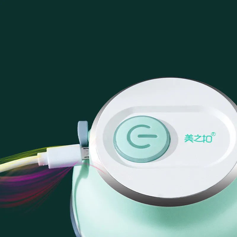 Portable electric garlic cutter with transparent chopping cup and stainless steel blades