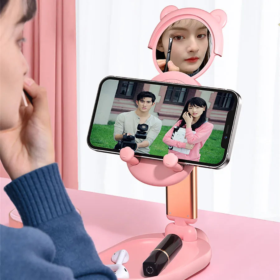 Blue adjustable desk phone and tablet stand with integrated mirror and non-slip silicone base.