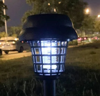 Solar mosquito killer lamp with white and purple LED lights for outdoor insect control