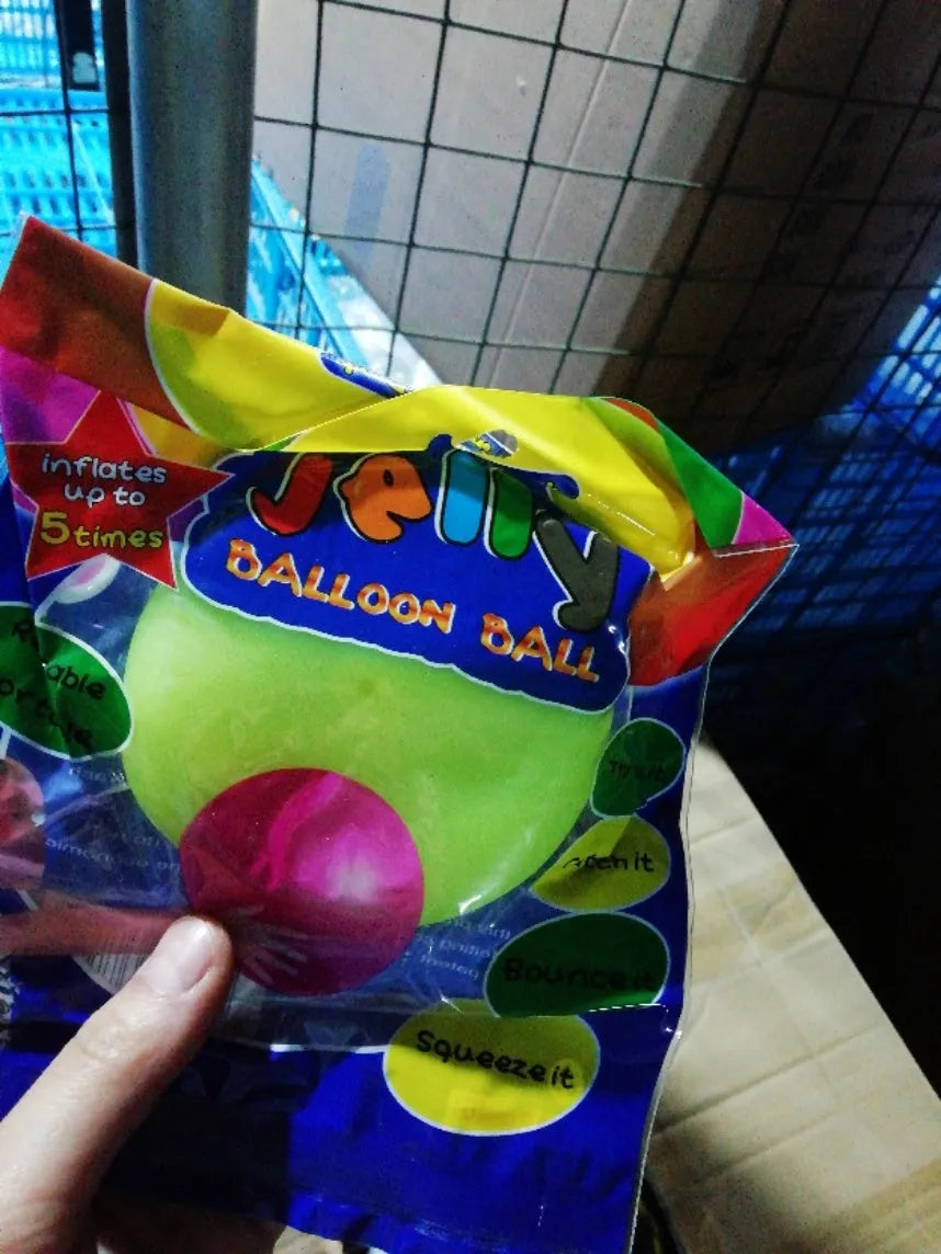 TPR inflatable ball toy in pink, yellow, green, and blue colours showing 40cm to 120cm size range
