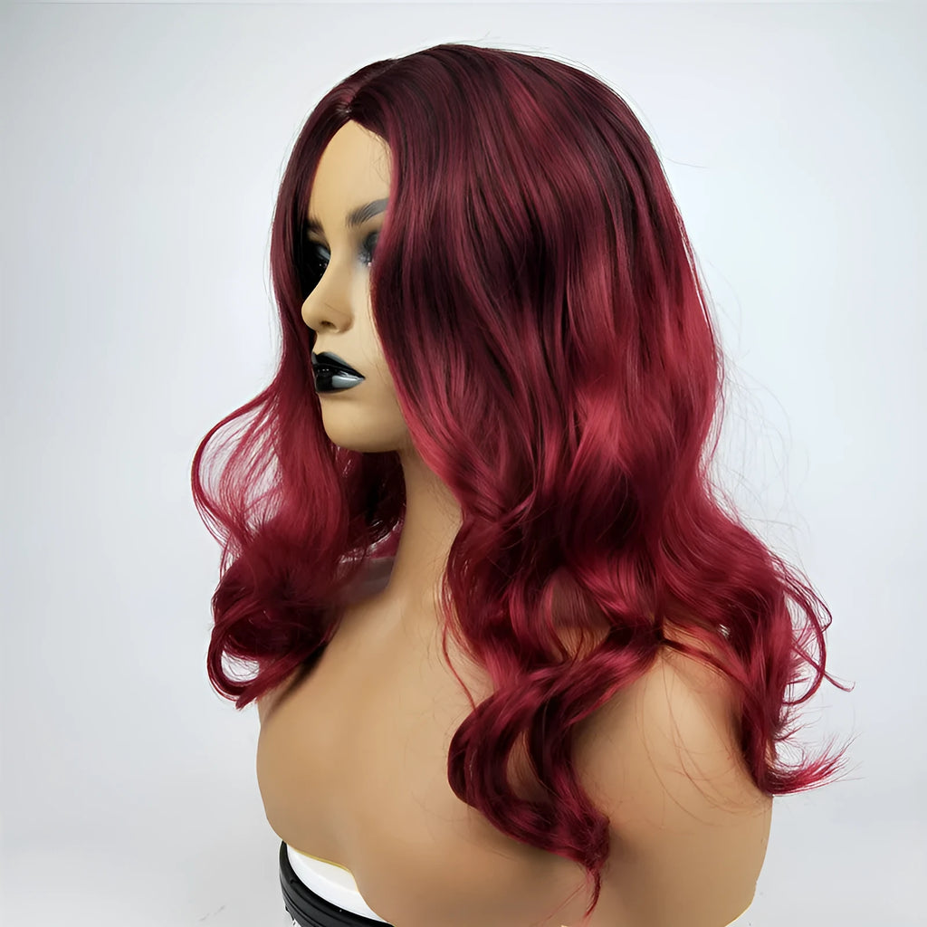 Burgundy long curly wig with big wavy gradient colour and centre bangs on a mannequin