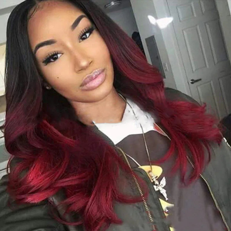 Burgundy long curly wig with big wavy gradient colour and centre bangs on a mannequin