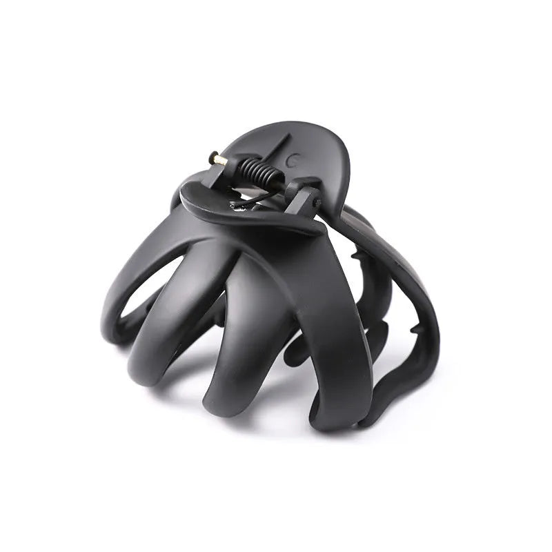Children's plastic hair clip in small size available in green, dark blue, wine red, black, dark pink, and blue gray.