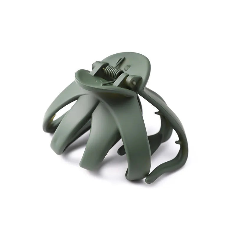 Children's plastic hair clip in small size available in green, dark blue, wine red, black, dark pink, and blue gray.