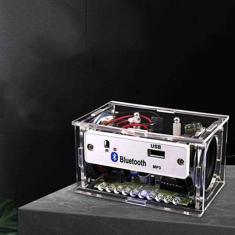 DIY Bluetooth speaker assembly kit with electronic components and transparent acrylic housing
