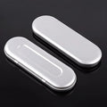 Rectangular frosted tinplate metal box for pen and cosmetic storage.