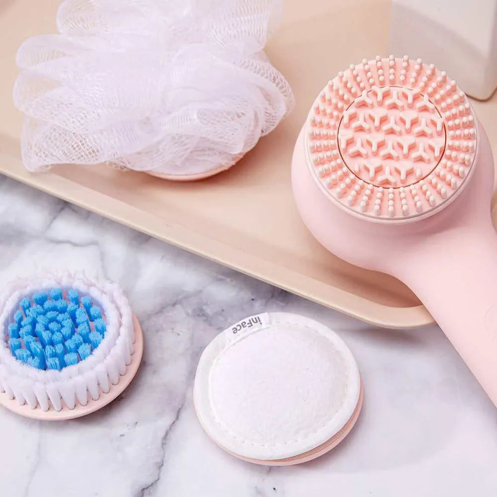 Grey and pink electric shower brush with rotating massage heads