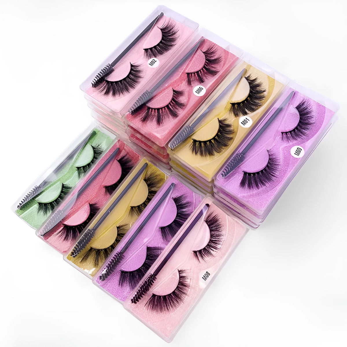 One pair of natural 3D imitation mink false eyelashes in elongated eye tail style with a brush on a white background