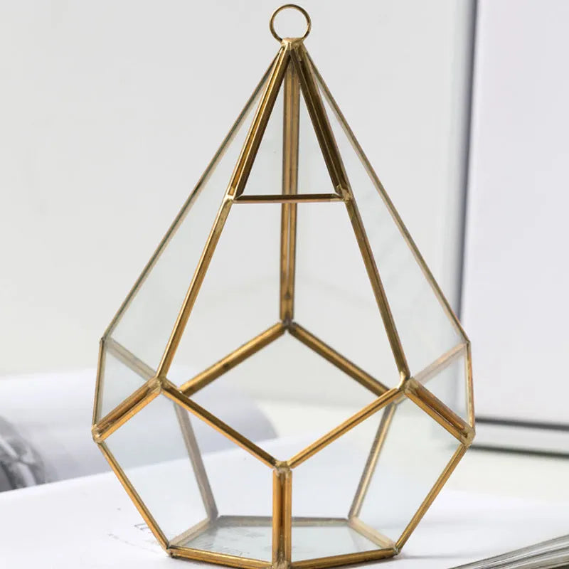 Square metal-framed glass succulent planter in two size options for home decoration.