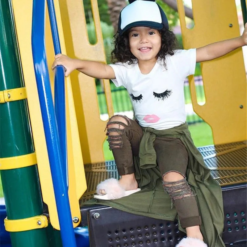 Pudcoco white two-piece girl set with eyelash short-sleeve top and ripped trousers on child model