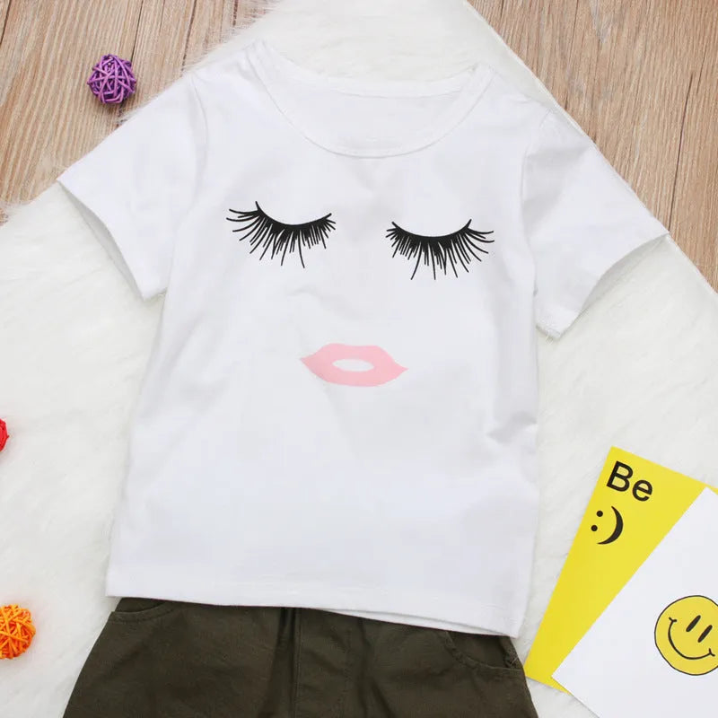 Pudcoco white two-piece girl set with eyelash short-sleeve top and ripped trousers on child model