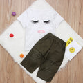 Pudcoco white two-piece girl set with eyelash short-sleeve top and ripped trousers on child model