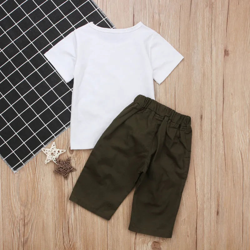 Pudcoco white two-piece girl set with eyelash short-sleeve top and ripped trousers on child model