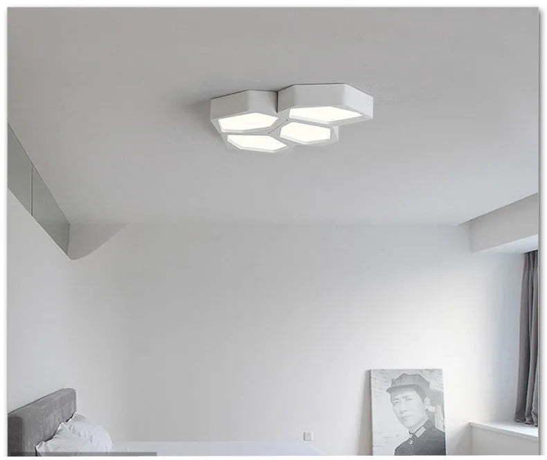 Geometric shaped iron frame LED wall light with remote control in black or white colour