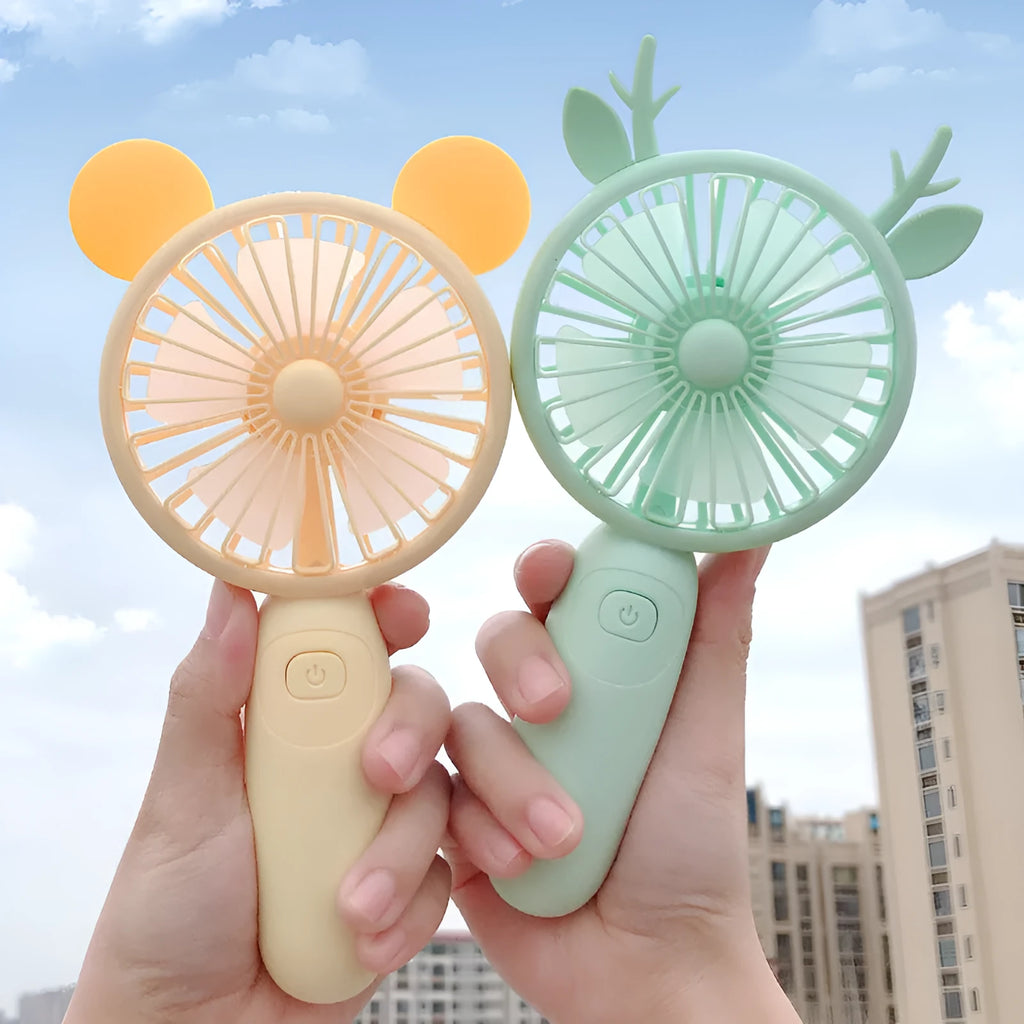 Handheld mini USB rechargeable fan with cartoon design in blue, green, pink, or yellow colours