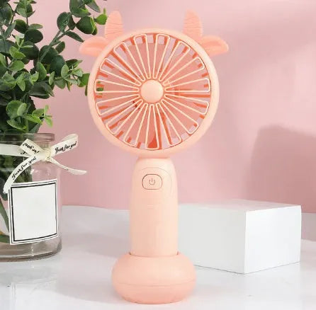 Handheld mini USB rechargeable fan with cartoon design in blue, green, pink, or yellow colours