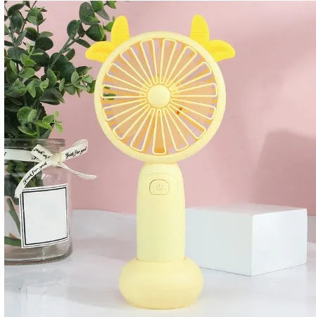 Handheld mini USB rechargeable fan with cartoon design in blue, green, pink, or yellow colours