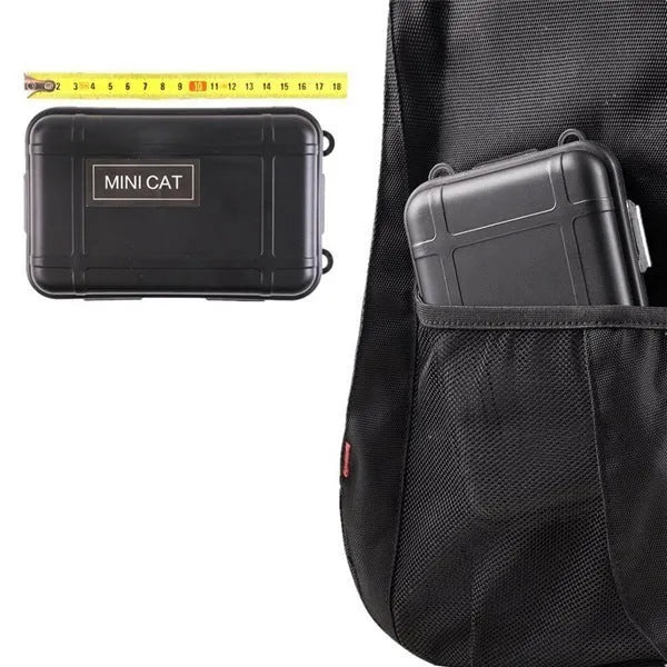 13-piece outdoor survival treasure box set with black shockproof case, tactical flashlight, compass, wire saw, and survival blanket