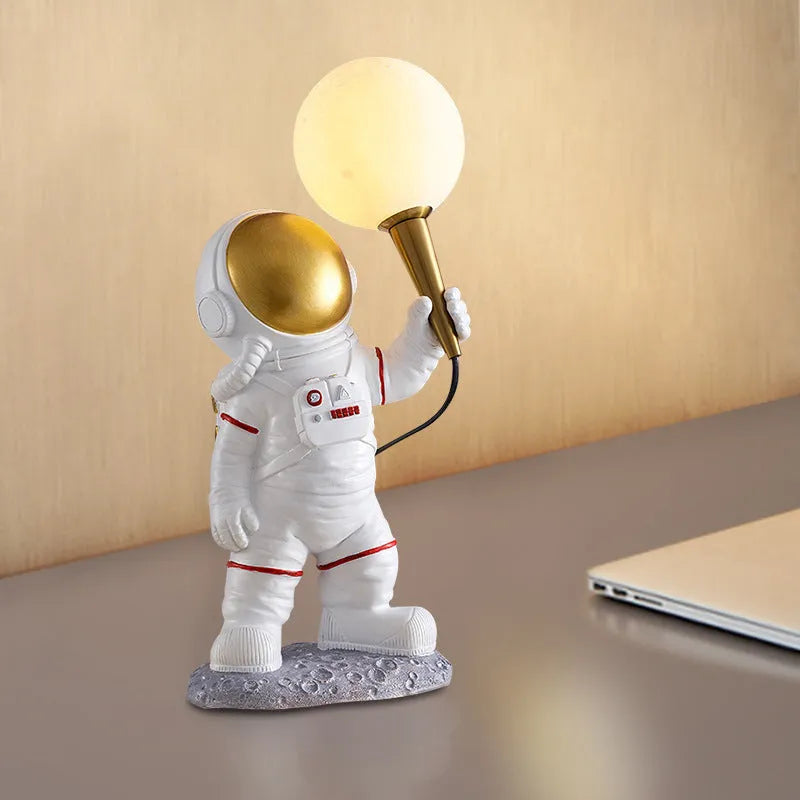 White astronaut desk lamp with night light function in seated, standing and wall-mounted styles