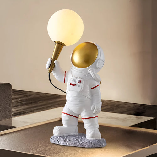 White astronaut desk lamp with night light function in seated, standing and wall-mounted styles