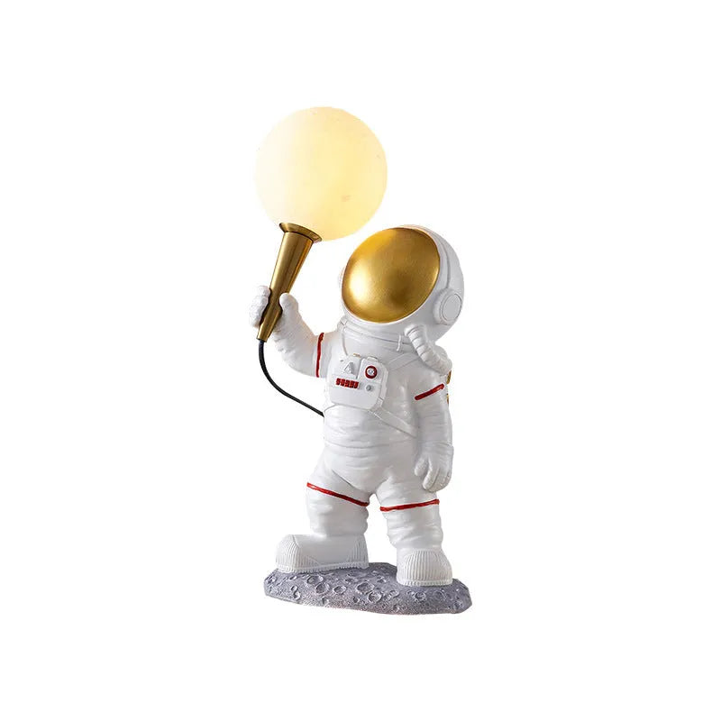 White astronaut desk lamp with night light function in seated, standing and wall-mounted styles