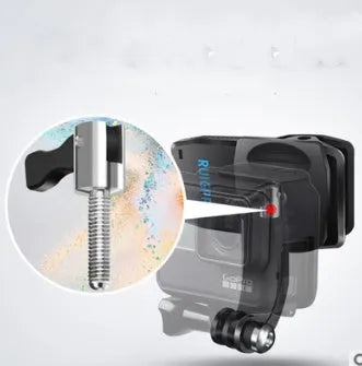 Silver and black Gopro backpack mounting clip with 360-degree rotating head on a backpack strap.