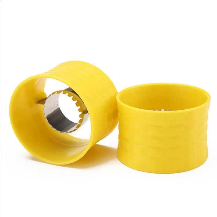 Yellow manual corn grinder thresher kitchen tool with corn-shaped design and stainless steel gear.
