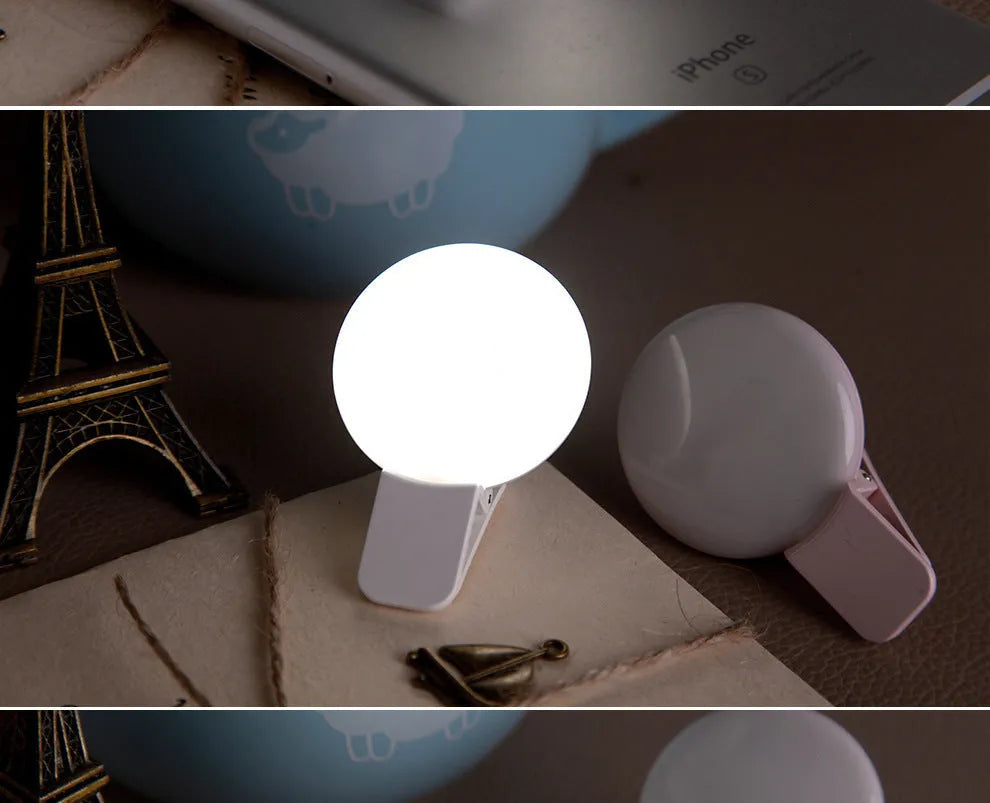 Circular mobile phone selfie ring light attached to smartphone providing frontal illumination