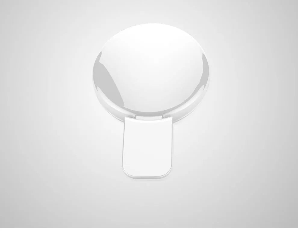 Circular mobile phone selfie ring light attached to smartphone providing frontal illumination