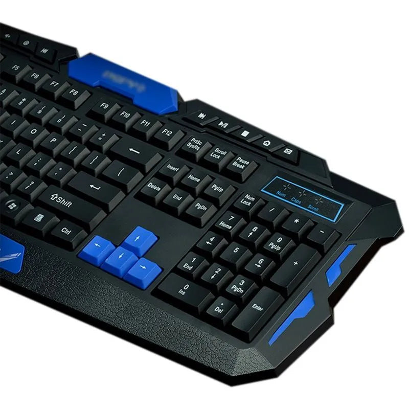 Black and blue wireless keyboard and mouse set with ergonomic design on a desk