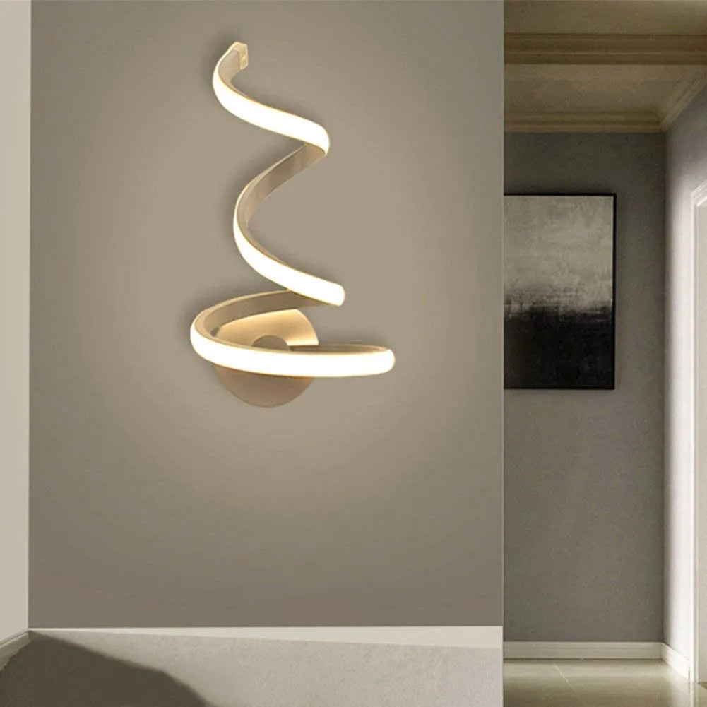 Modern Outer Snake style aluminium wall lamp with LED light in warm white or white light.