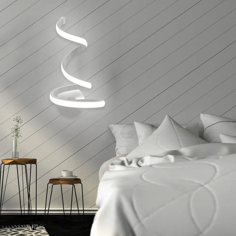 Modern Outer Snake style aluminium wall lamp with LED light in warm white or white light.