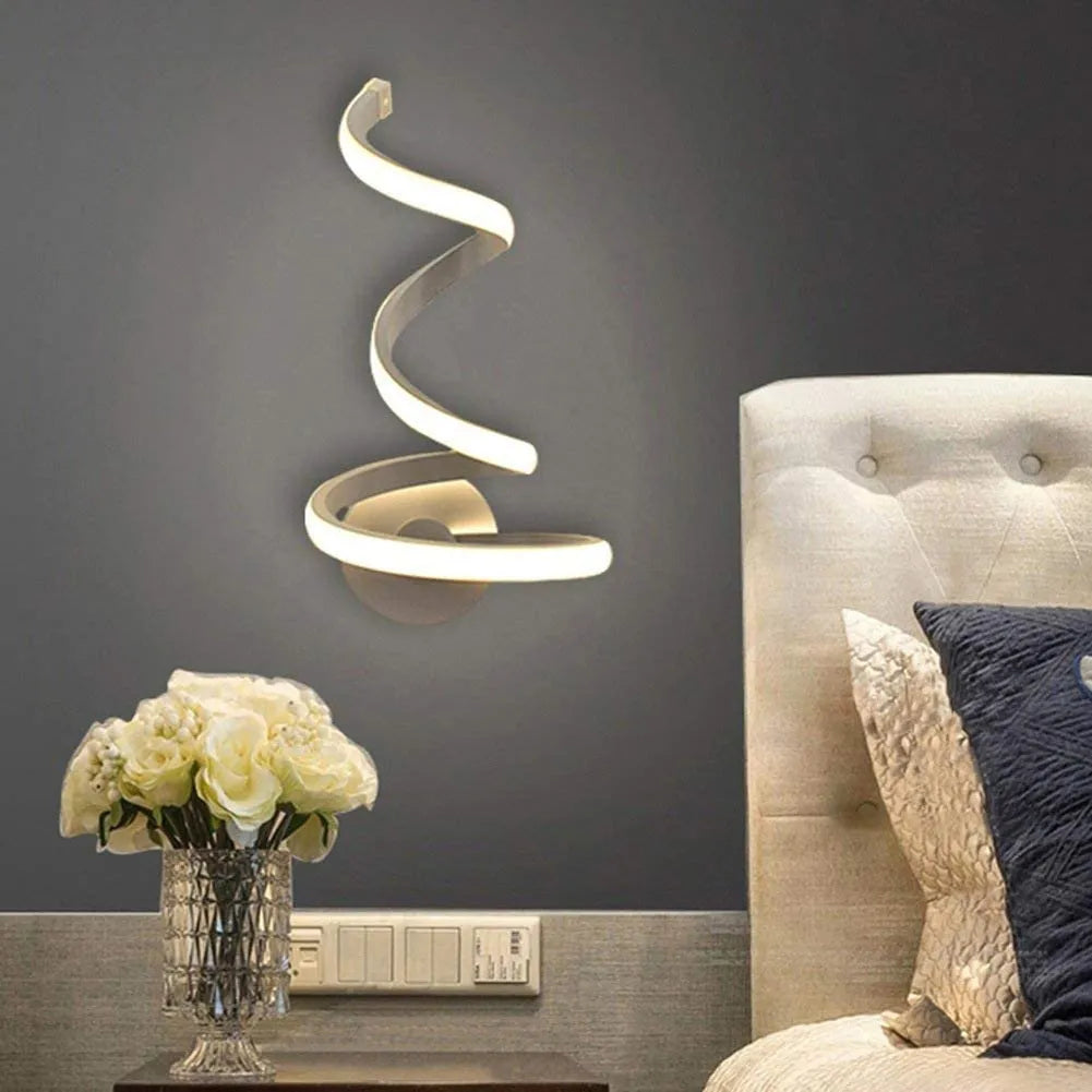 Modern Outer Snake style aluminium wall lamp with LED light in warm white or white light.