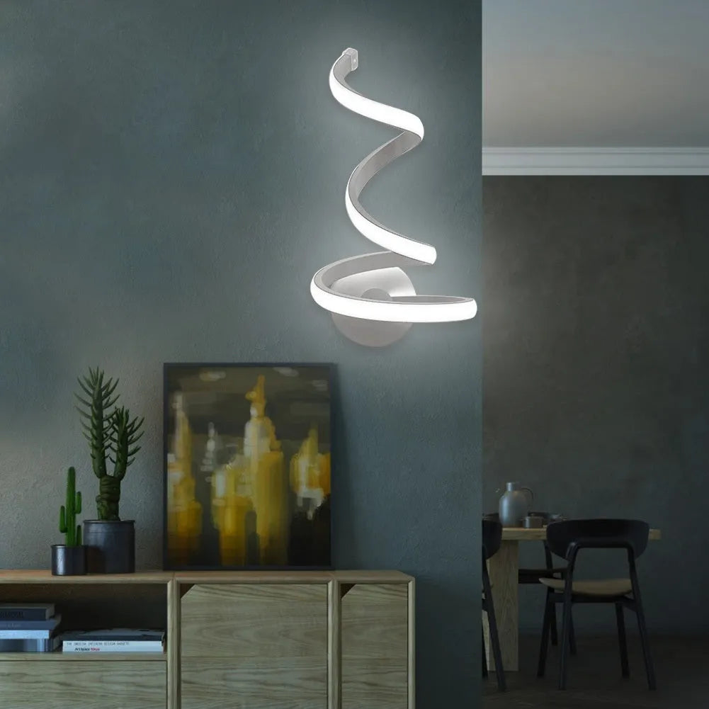 Modern Outer Snake style aluminium wall lamp with LED light in warm white or white light.