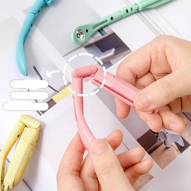 Folding book light with night light function in blue, green, pink, or yellow colour options.