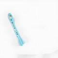 Folding book light with night light function in blue, green, pink, or yellow colour options.