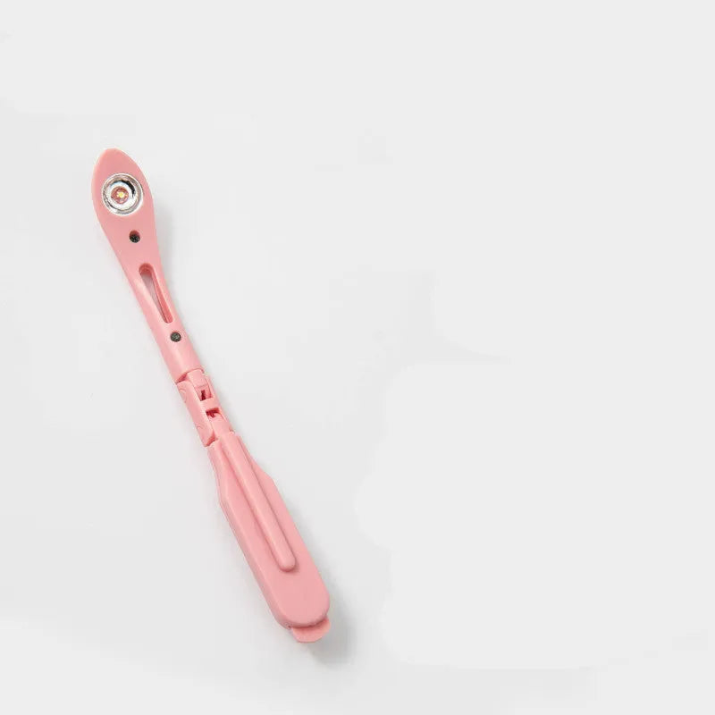 Folding book light with night light function in blue, green, pink, or yellow colour options.