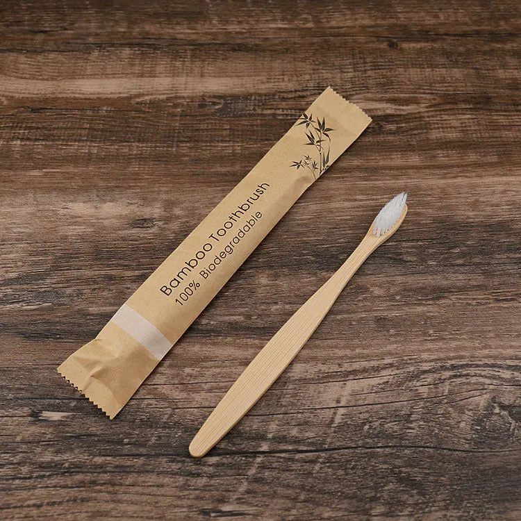 Set of 10 bamboo toothbrushes in multiple colours showing natural bamboo handles and soft bristles