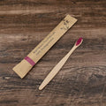 Set of 10 bamboo toothbrushes in multiple colours showing natural bamboo handles and soft bristles