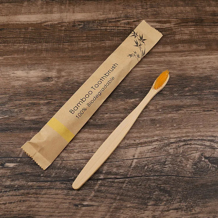 Set of 10 bamboo toothbrushes in multiple colours showing natural bamboo handles and soft bristles