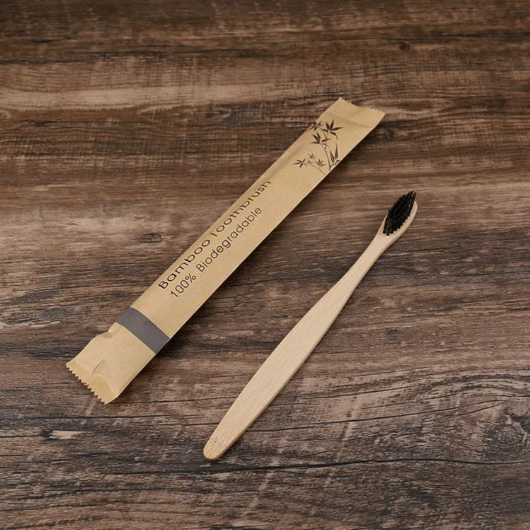 Set of 10 bamboo toothbrushes in multiple colours showing natural bamboo handles and soft bristles