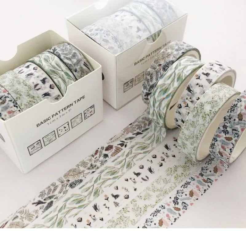 Set of colour gift boxes with Salt Pocket stickers and a sheet of cane paper for crafting.