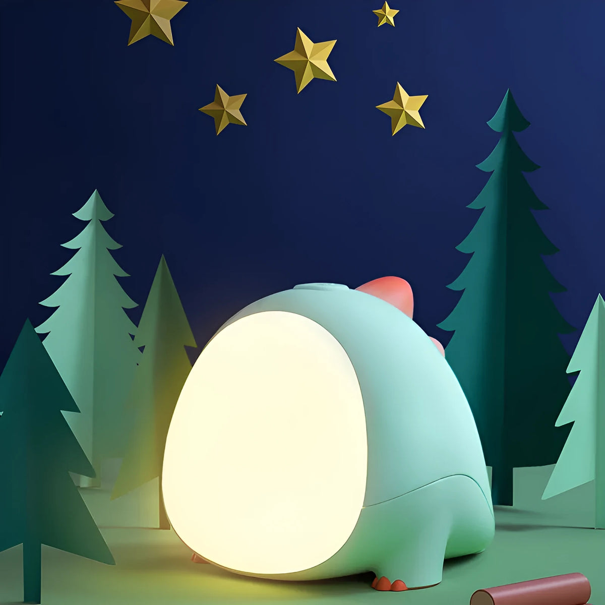 Green dinosaur silicone night light with USB cable, on a bedside table, showing warm light setting