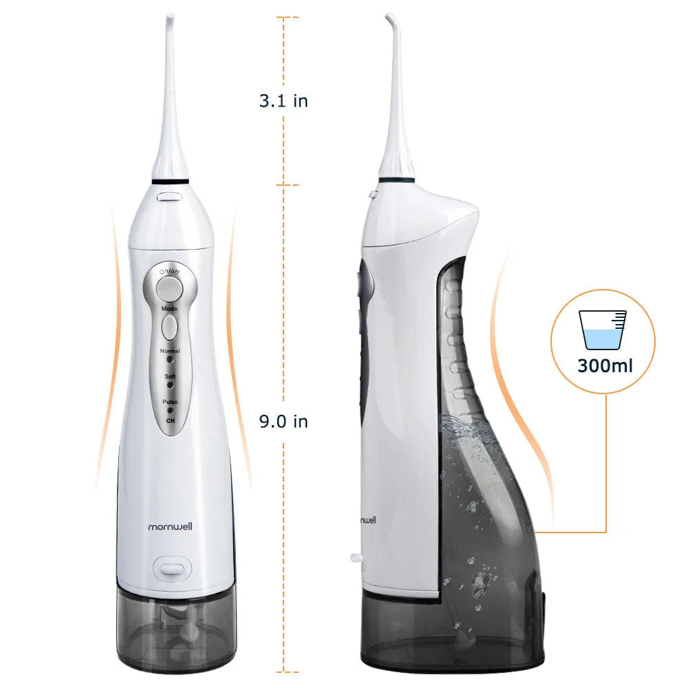White portable oral irrigator with large water tank and multiple nozzles on a bathroom counter