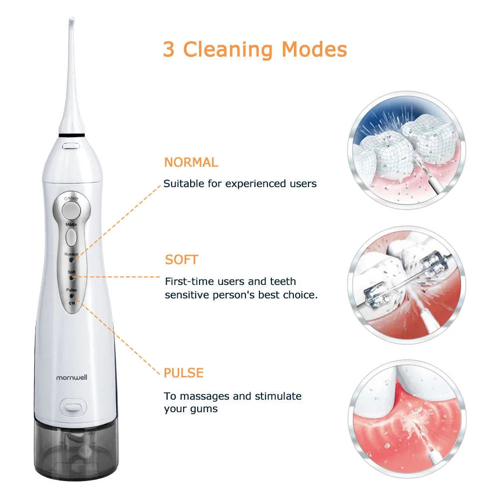 White portable oral irrigator with large water tank and multiple nozzles on a bathroom counter