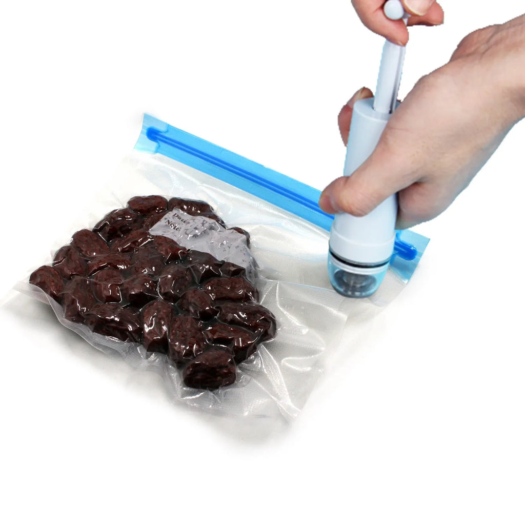Green manual vacuum compression bag with pump for clothes storage organisation